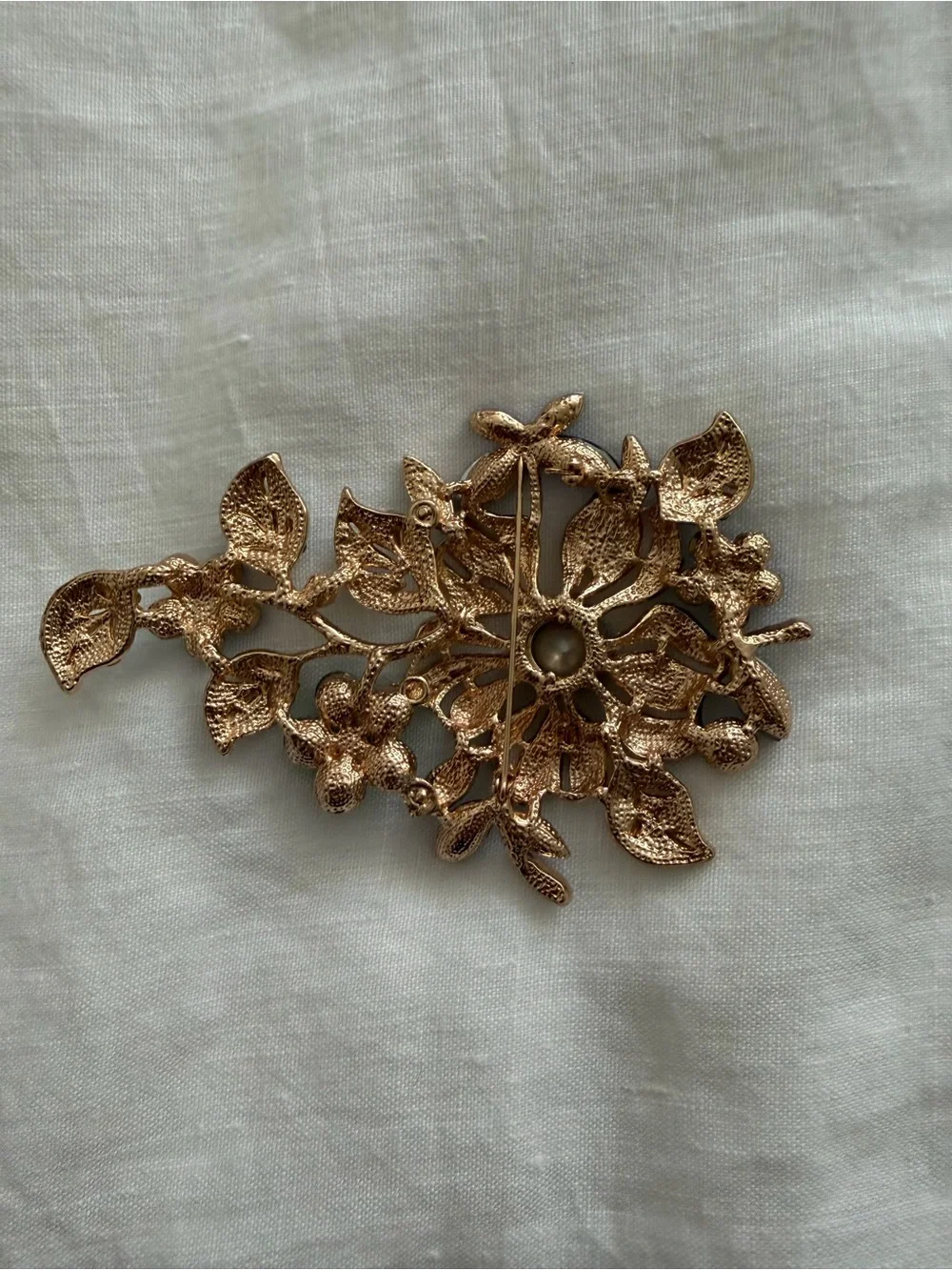 Gold-Tone Floral Crystal Brooch in Blue and Teal